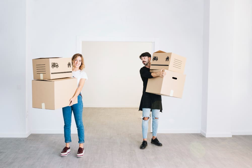 couples moving house items while moving to a new house couples moving house items while moving to a new house