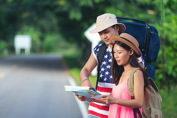 Couple discussing moving services and planning their relocation at home