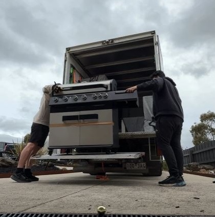 2 men and a van loading furniture